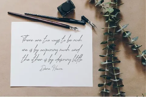 Jhenyta Signature font